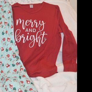 Merry Makers pajama set size medium. Top is red , pants  green w/ xmas patterns